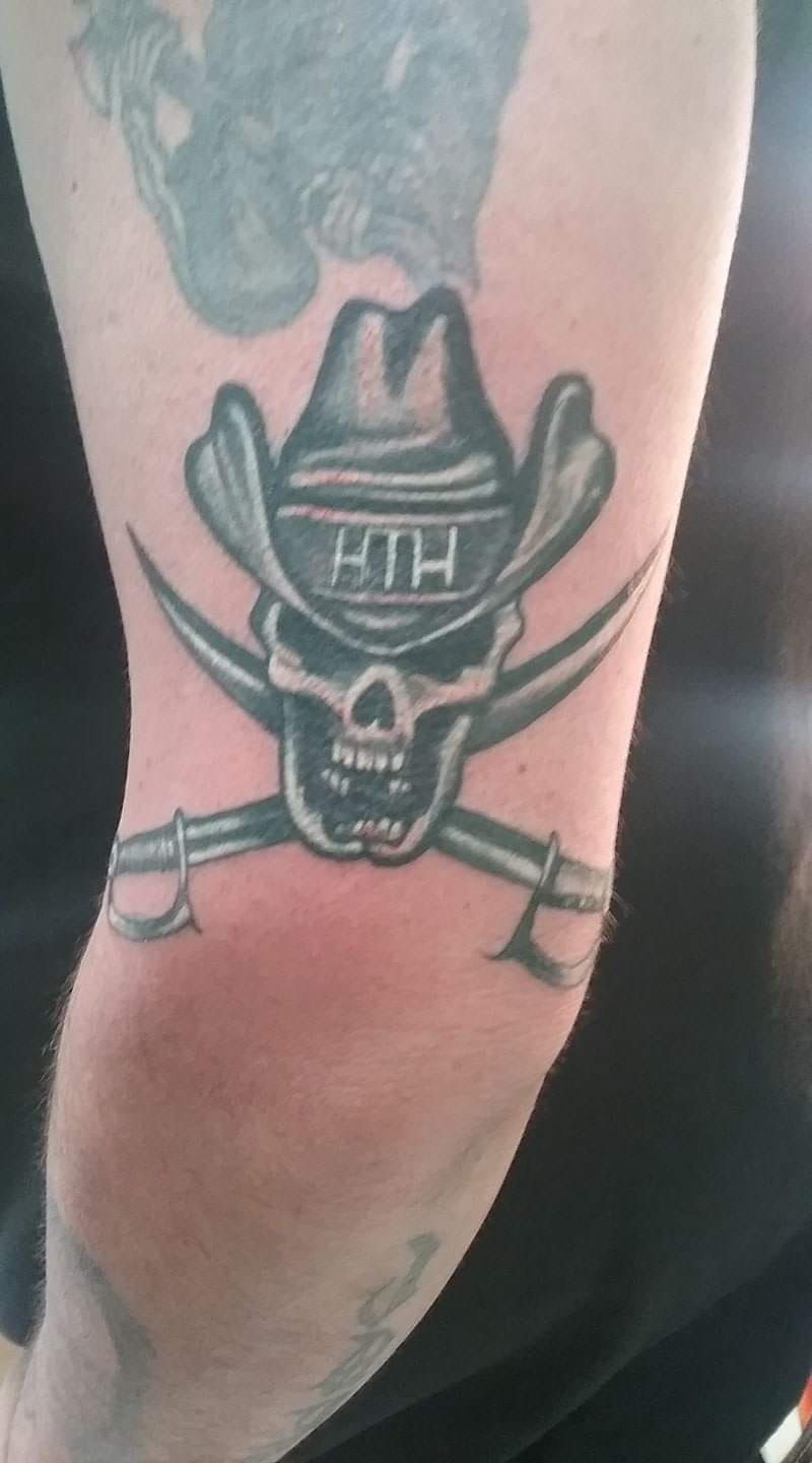 Fan tattoo of HTH skull and sabers
