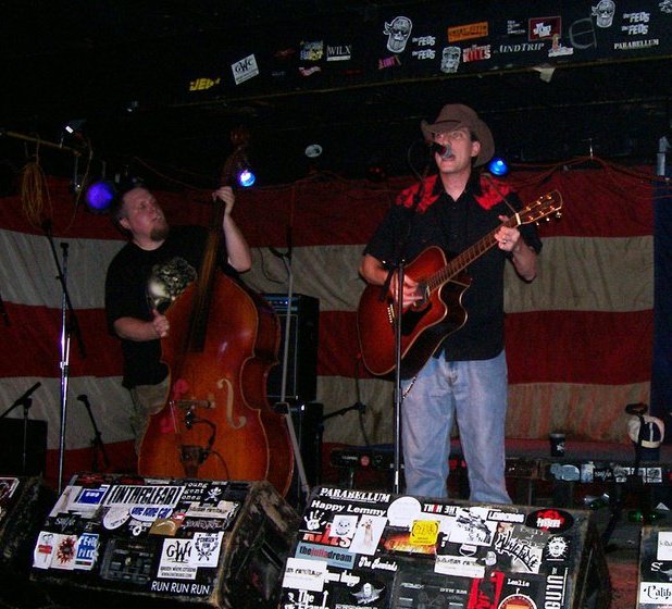 Stemp and T. Junior with American flag